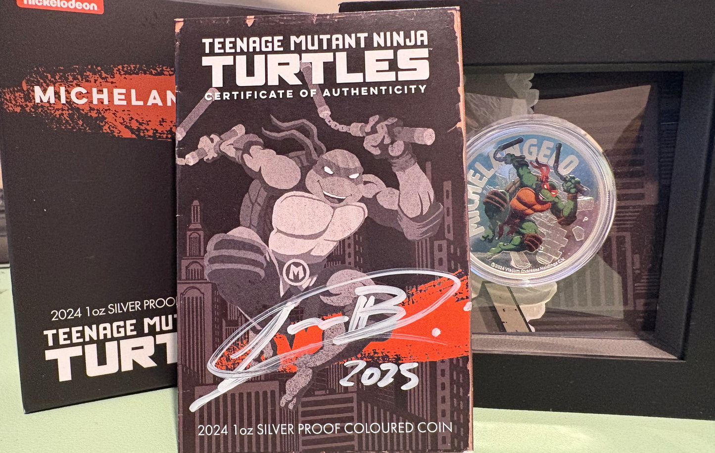 2024 TMNT Michaelangelo 1 Oz Silver Proof Coloured Coin - Signed by Lucas Bowers