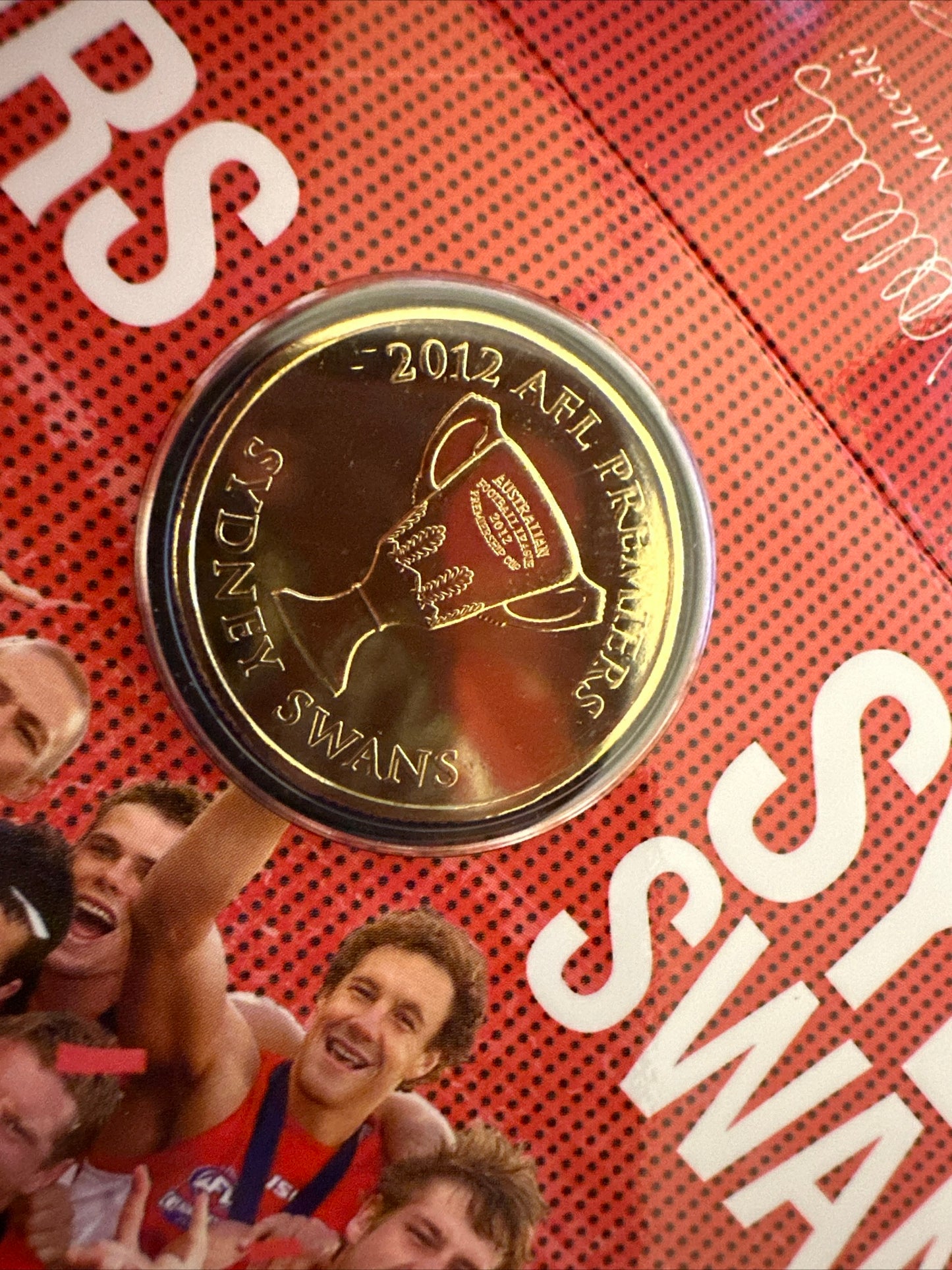 2012 AFL Premiers Sydney Swans Uncirculated $1 coin on card