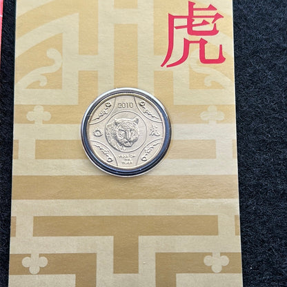 2010 $1 Lunar Year of the Tiger Al Br Unc Coin in RAM Card