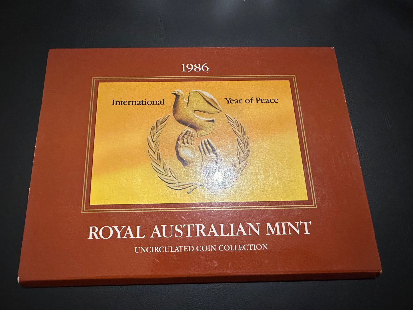 1986 " International Year of peace" 7 Uncirculated mint coin set "$1 peace coin"