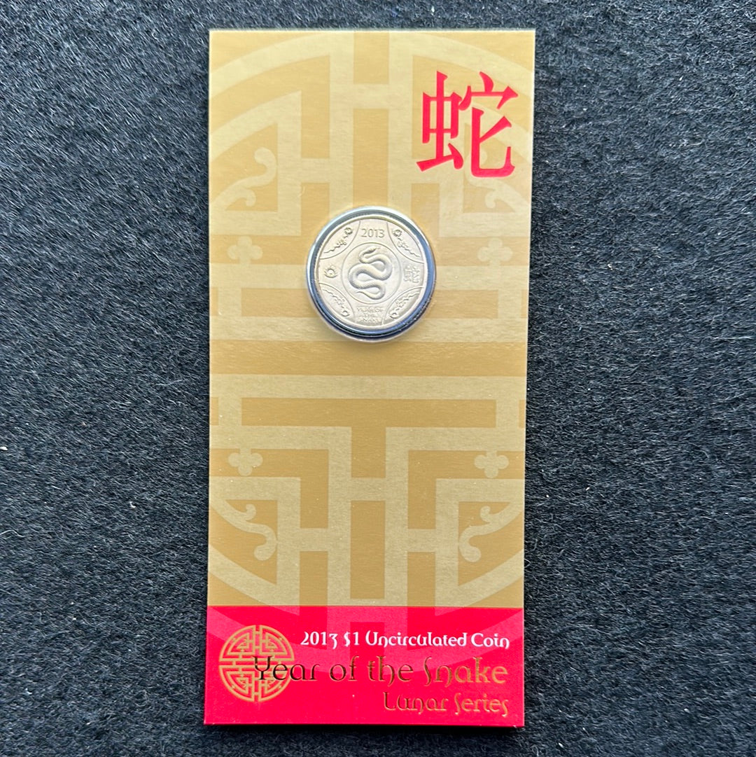 2013 $1 Lunar Year of the Snake Al Br Unc Coin in RAM Card