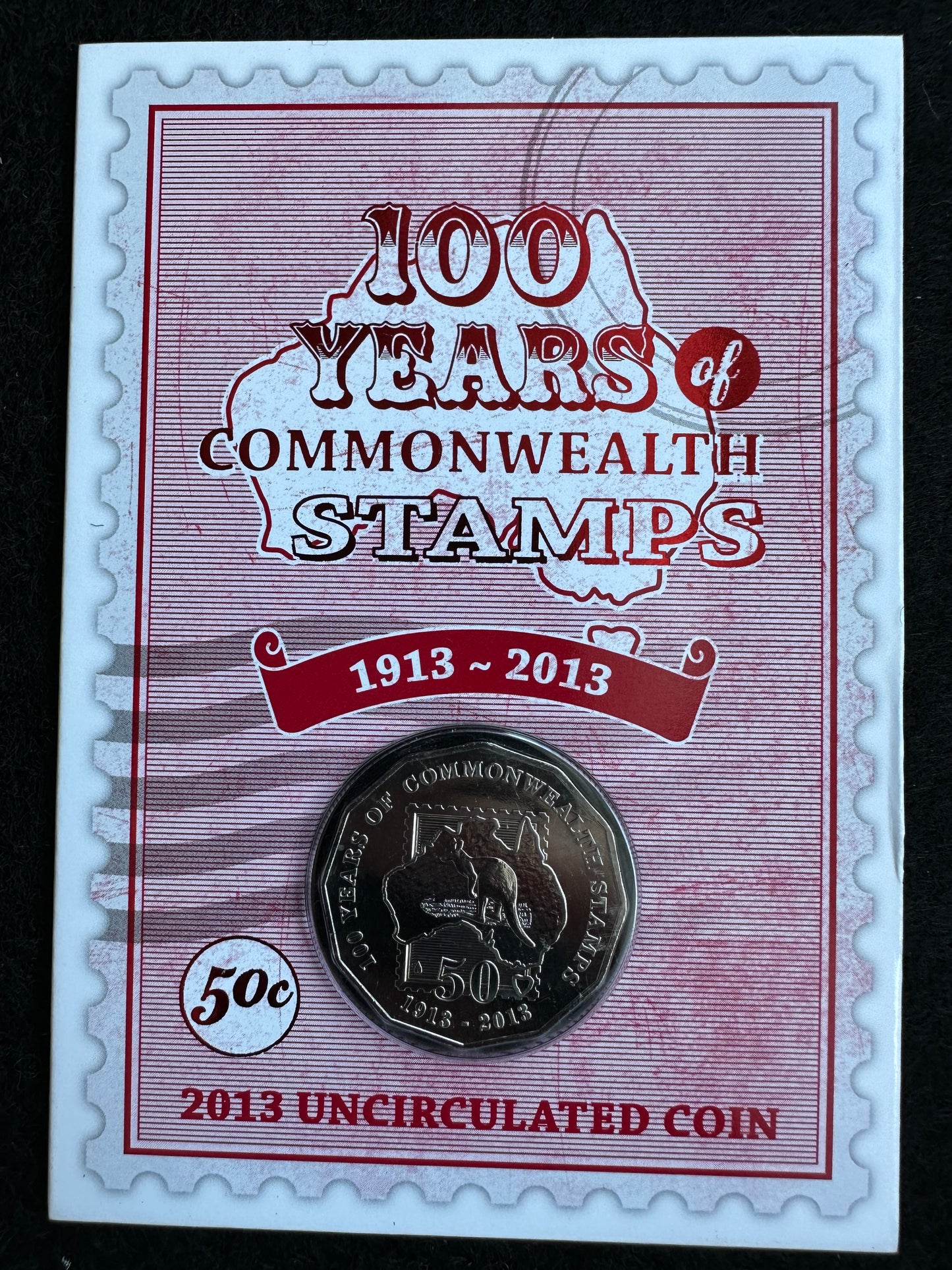 2013 50 cent 100 Years of Commonwealth Stamps carded coin