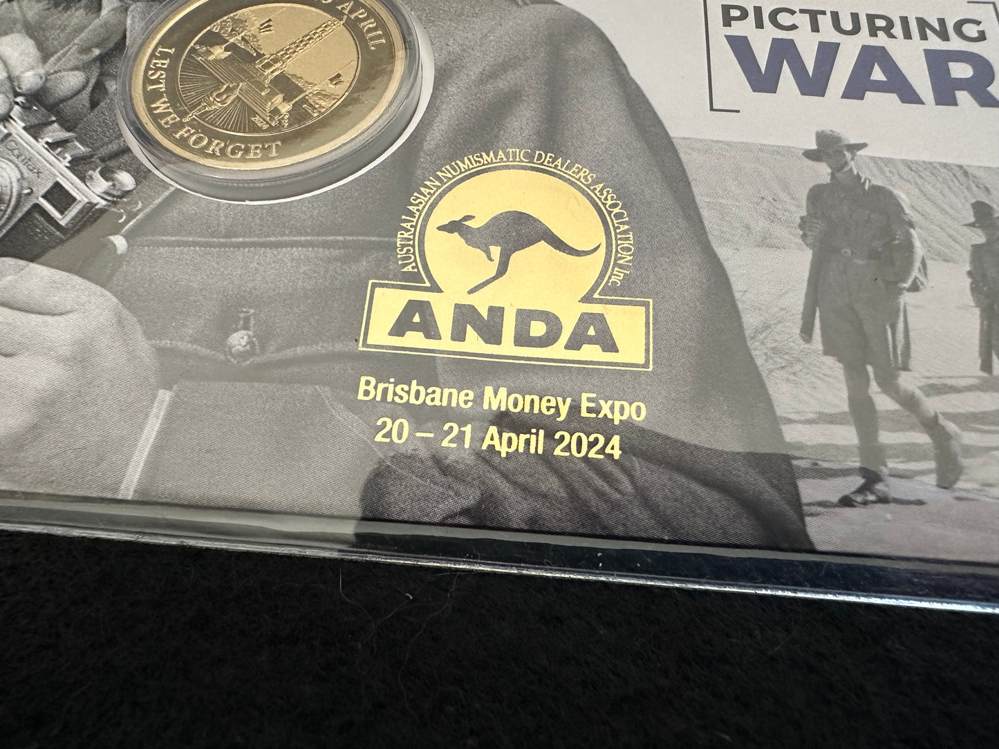 2024 Brisbane ANDA Overprint Lest We Forget - Picturing War PNC with Perth Mint $1