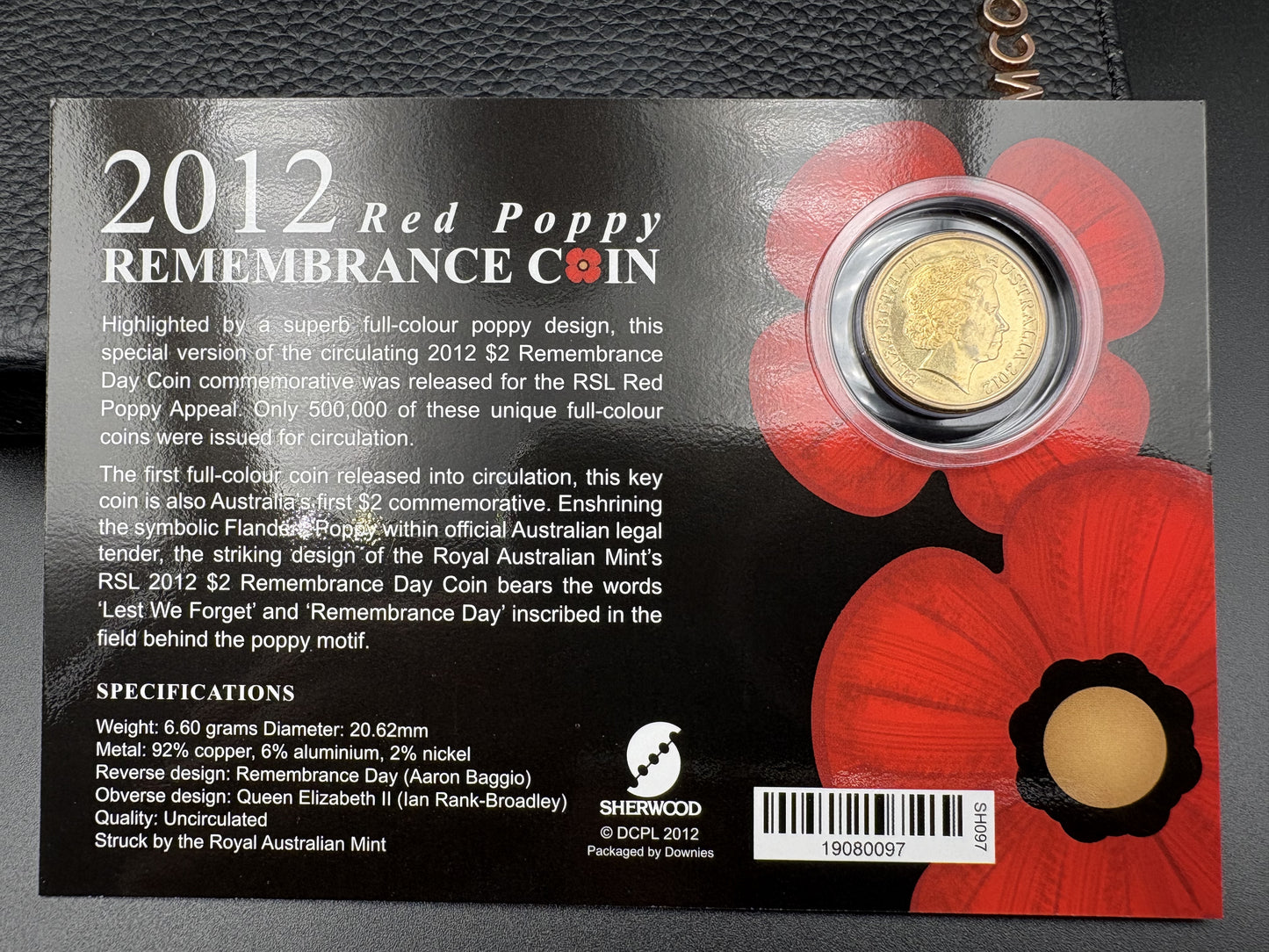 2012 Remembrance Day Red Poppy $2 Coin in Downies Card