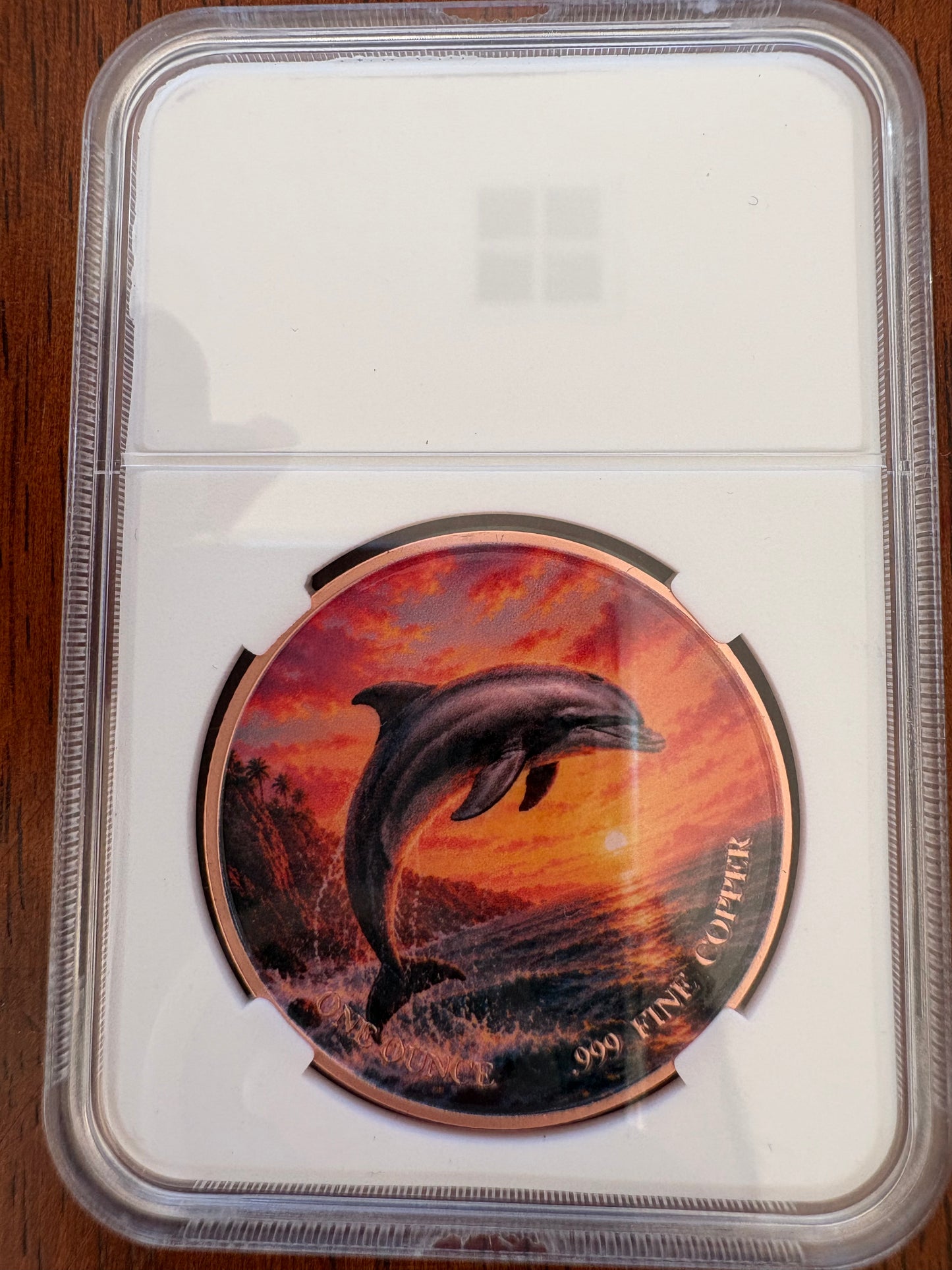 1oz .999 Fine Copper Dolphin Coloured Round – Animal Collector Series – Slabbed